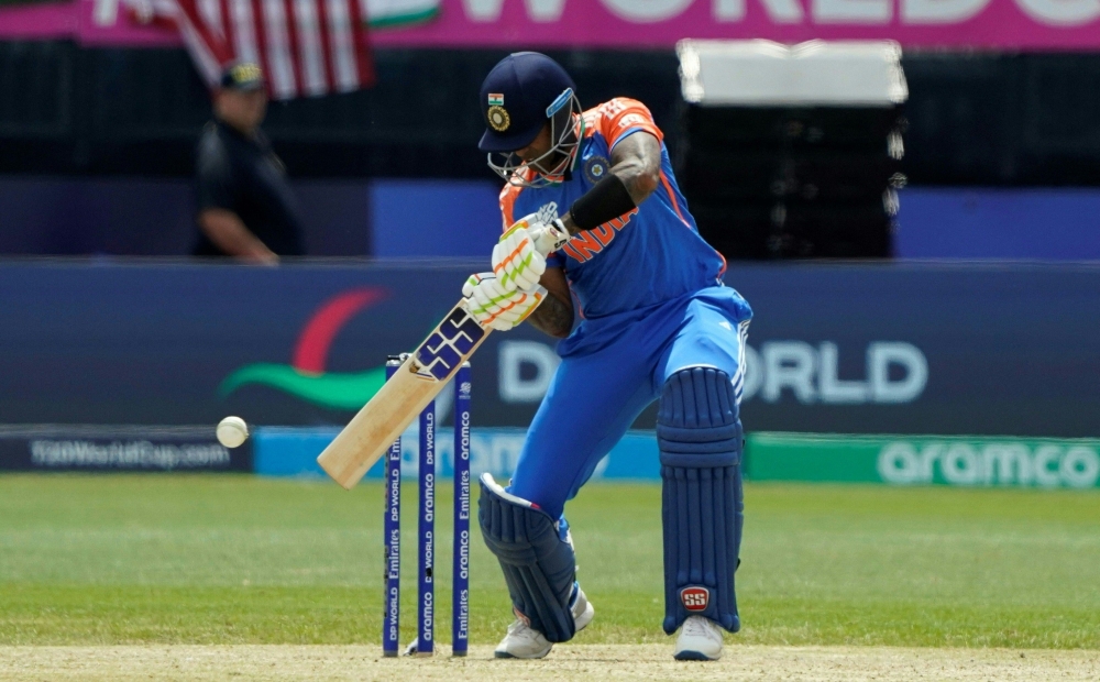 India's Surya Kumar Yadav takes a shot during the ICC men's Twenty20 World Cup 2024 group A cricket match between the USA and India at Nassau County International Cricket Stadium in East Meadow, New York on June 12, 2024.  (Photo by TIMOTHY A. CLARY / AFP)

