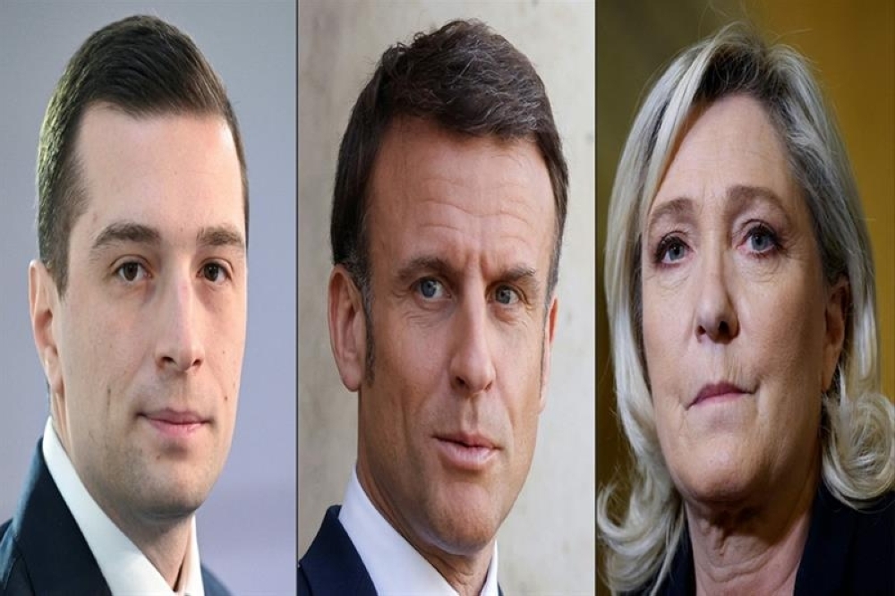 French far-right Rassemblement National (RN) party President and electoral list leader Jordan Bardella, France s President Emmanuel Macron, and National Assembly parliamentary group President for the French far-right Rassemblement National (RN) party Marine Le Pen.  -AFP