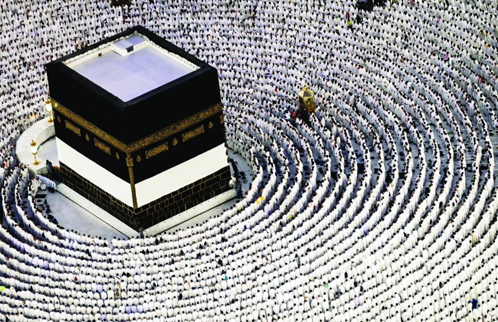Worshippers pray around the Kaaba at the Grand Mosque in Mecca