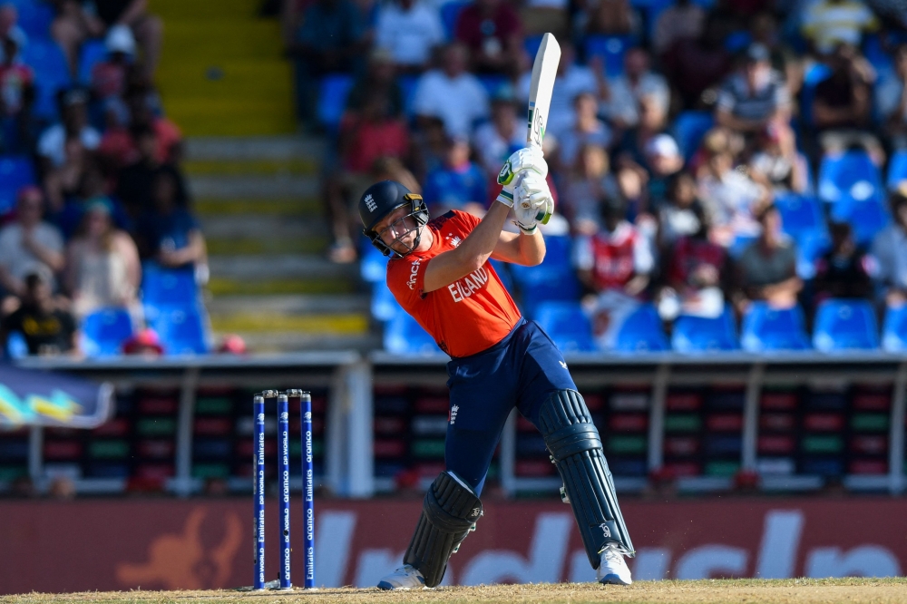 Jos Buttler of England hits 6 during the ICC men's Twenty20 World Cup 2024 group B cricket match between England and Oman 