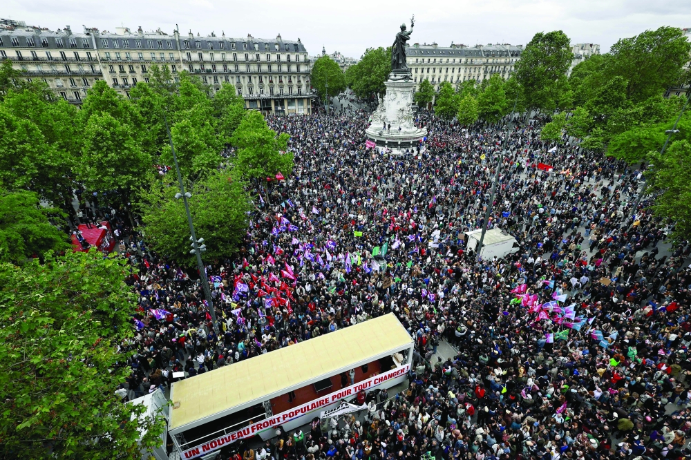 Protesters gather during an anti far-right rally following their significant gains in European Parliament elections, in Paris. — AFP 