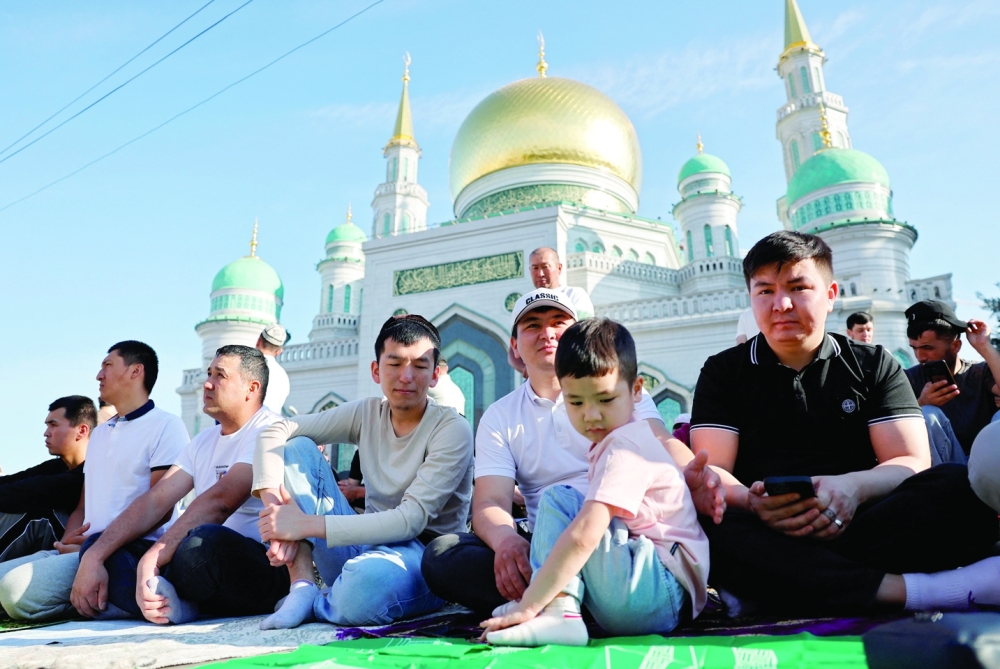 Muslims attend Eid al-Adha prayers in Moscow
