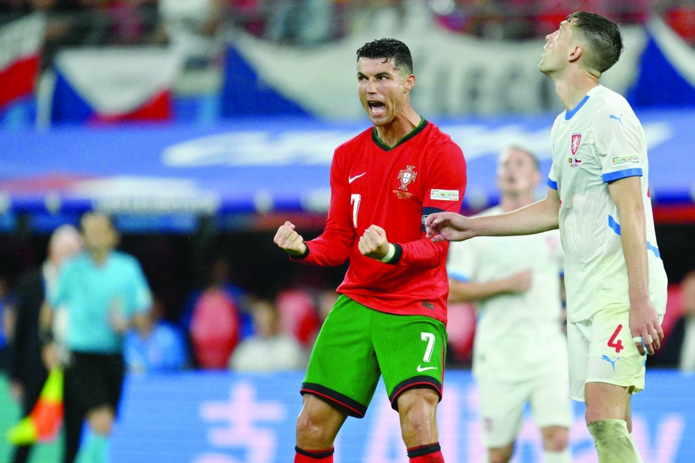 Cristiano Ronaldo celebrates after Portugal scored their second goal during the UEFA Euro 2024. AFP
