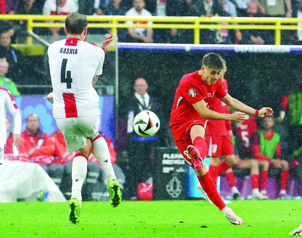 Turkey's Arda Guler scores their second goal. REUTERS