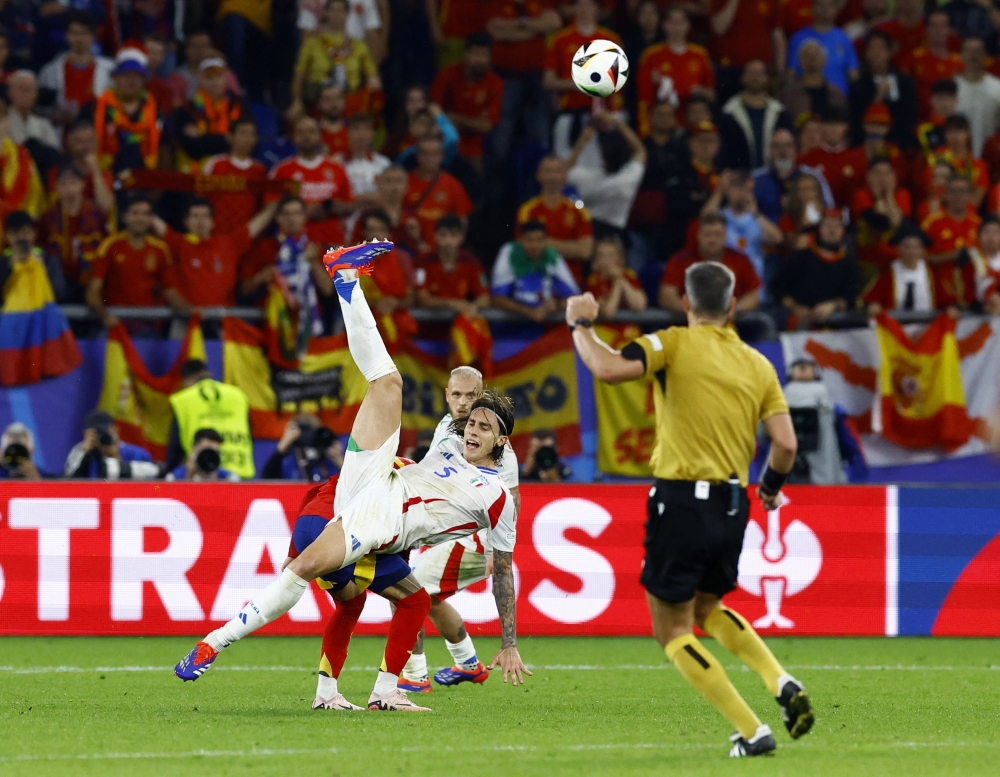 taly's Riccardo Calafiori in action -- REUTERS