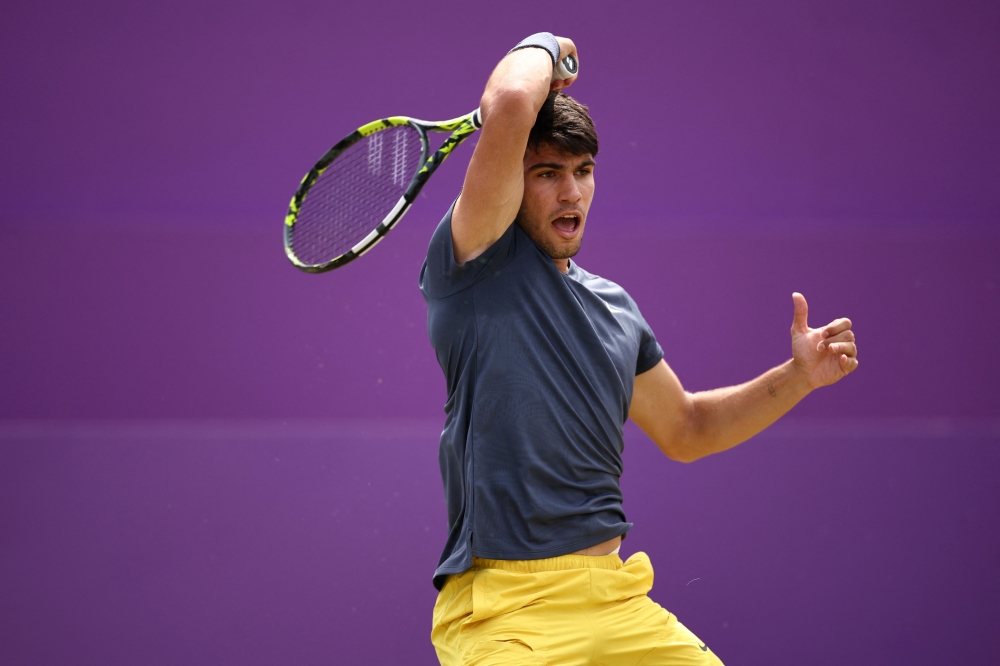 Spain's Carlos Alcaraz in action at the Cinch ATP tennis Championships at Queen's Club 