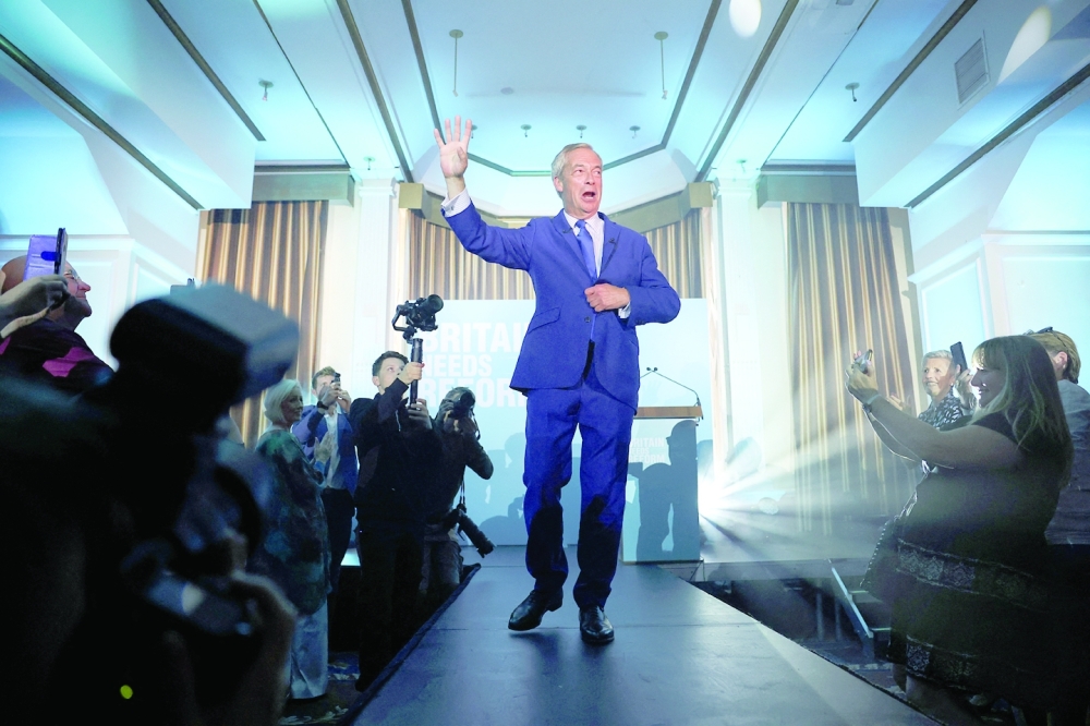 Britain's Reform UK Party Leader Nigel Farage gestures, during a campaign event in Blackpool, Britain. — Reuters 