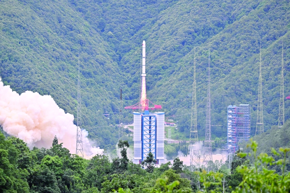 A Long March 2-C rocket carrying a satellite jointly developed by China and France, lifts off from a space base in Xichang. — AFP 