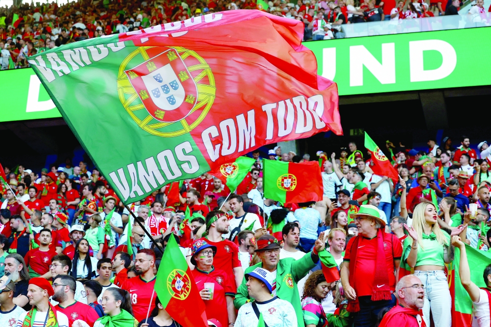  Portugal fans celebrate after the match.— REUTERS
