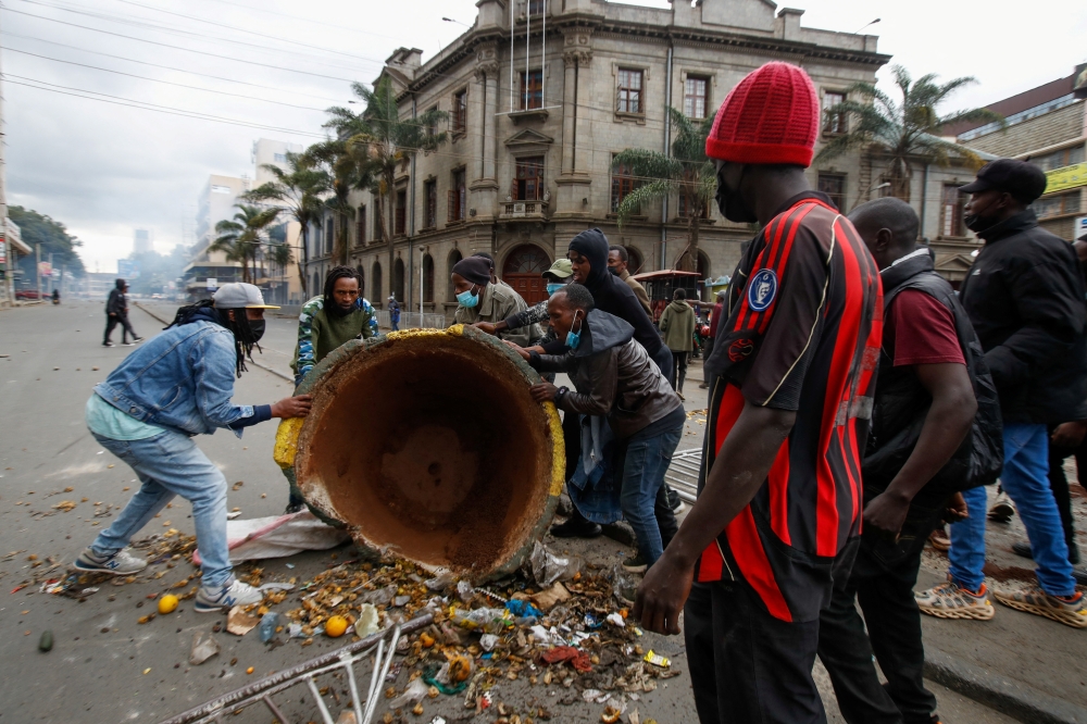 People take part in a demonstration over police killings of people protesting against Kenya's proposed finance bill 2024-2025 in Nairobi. - Reuters