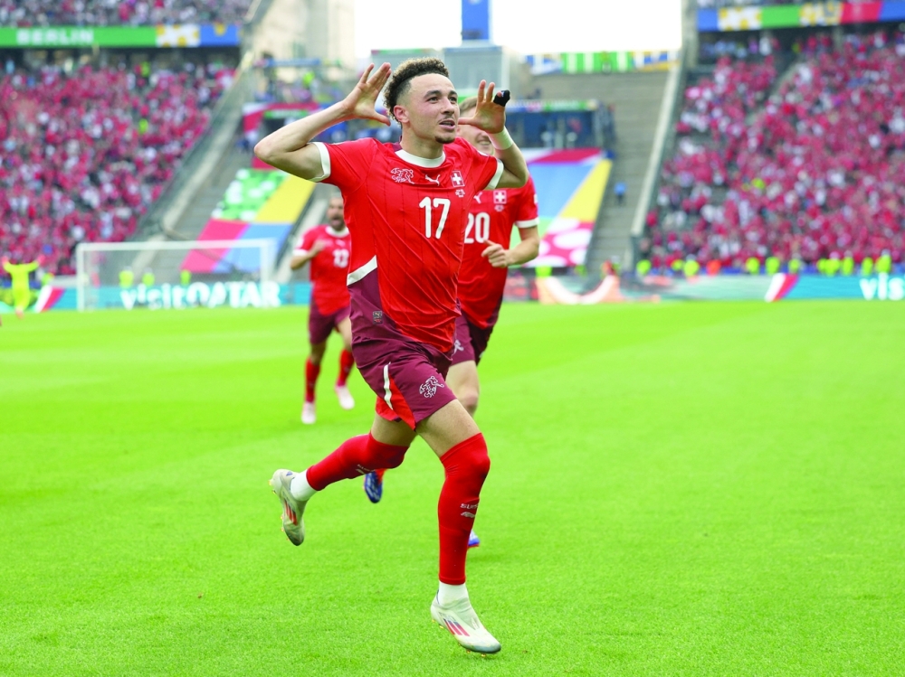 Switzerland's Ruben Vargas celebrates scoring their second goal. REUTERS