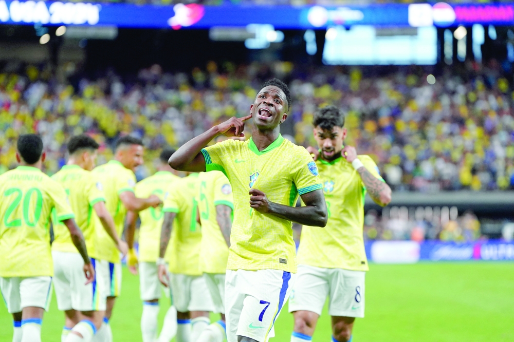 Vinicius Junior reacts after scoring a goal against Paraguay during the first half at Allegiant Stadium.