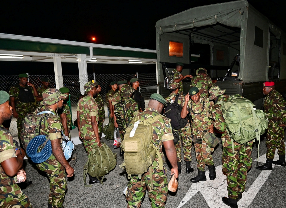 Members of the Trinidad and Tobago Regiment arrive ahead of Hurricane Beryl at Tobago's A.N.R. Robinson International Airport in Crown Point, Trinidad and Tobago. — AFP 