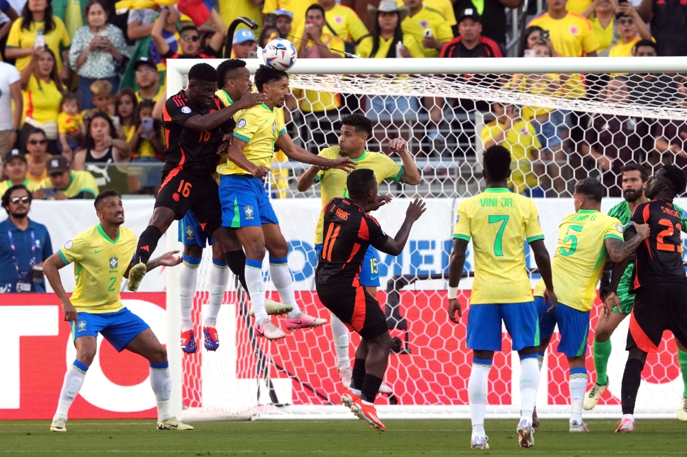 Jul 2, 2024; Santa Clara, CA, USA; Brazil defender Marquinhos (center left in air) heads the ball against Colombia midfielder Jefferson Lerma (16) during the second half at Levi's Stadium. Mandatory Credit: Darren Yamashita-USA TODAY Sports

