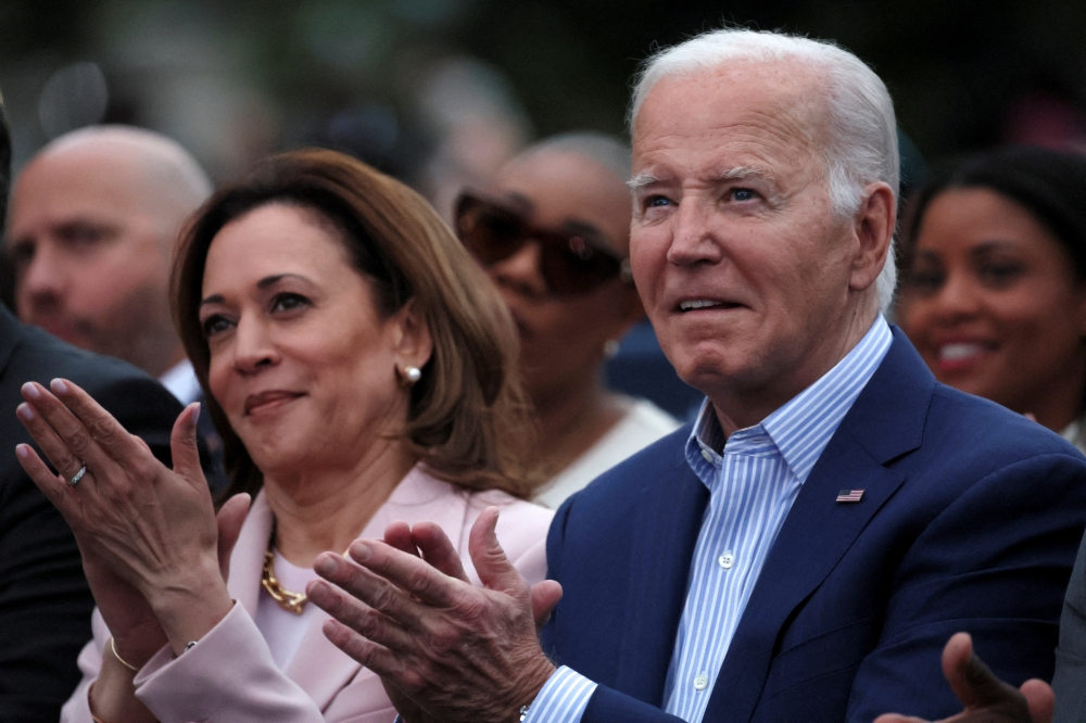 US President Joe Biden stands next to US Vice-President Kamala Harris while hosting a Juneteenth concert on the South Lawn at the White House in Washington, DC. - Reuters file 
