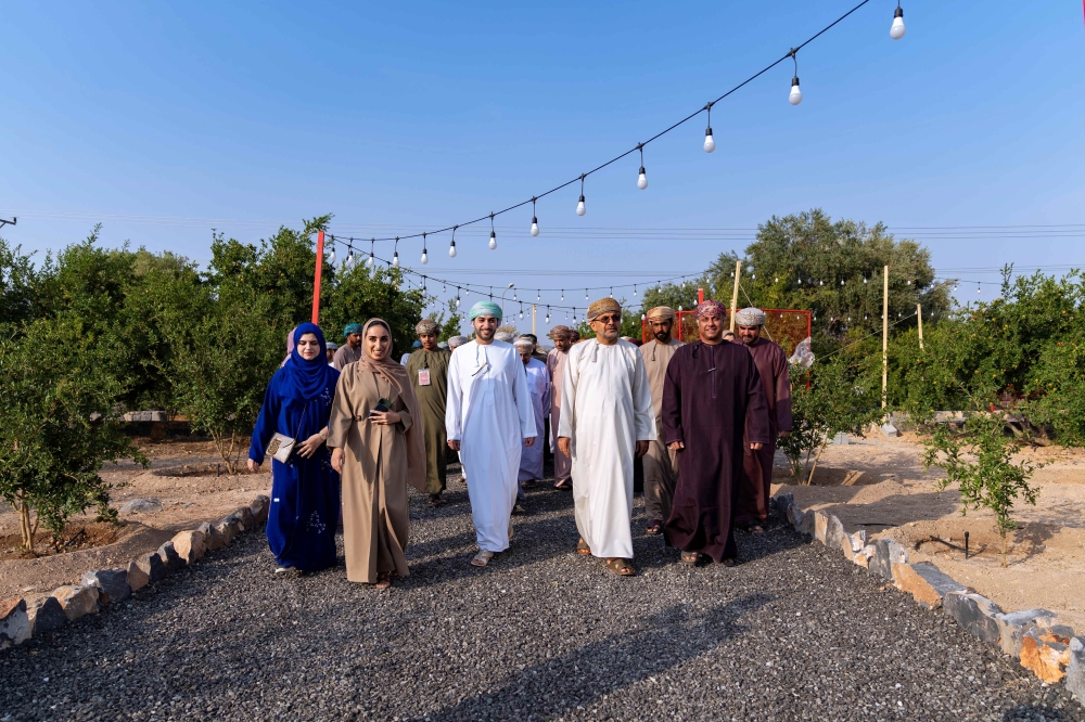Dignitaries and representatives of the key stakeholders touring the Janaen farm in Al Jabal Al Akhdar.