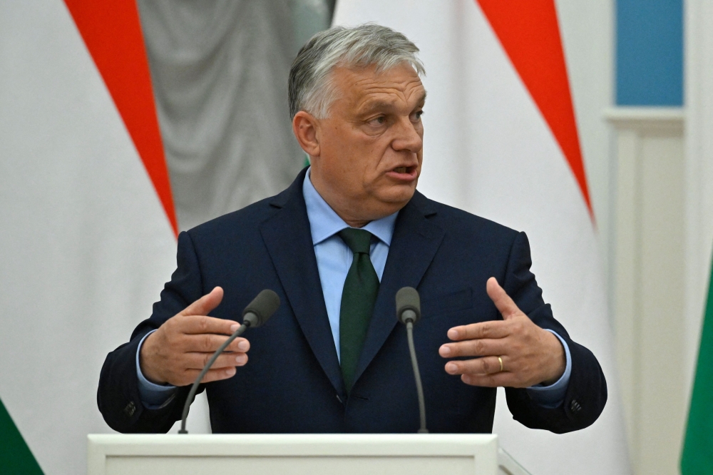 Hungary's Prime Minister Viktor Orban delivers a joint press statement with Russia's President following their talks at the Kremlin in Moscow 