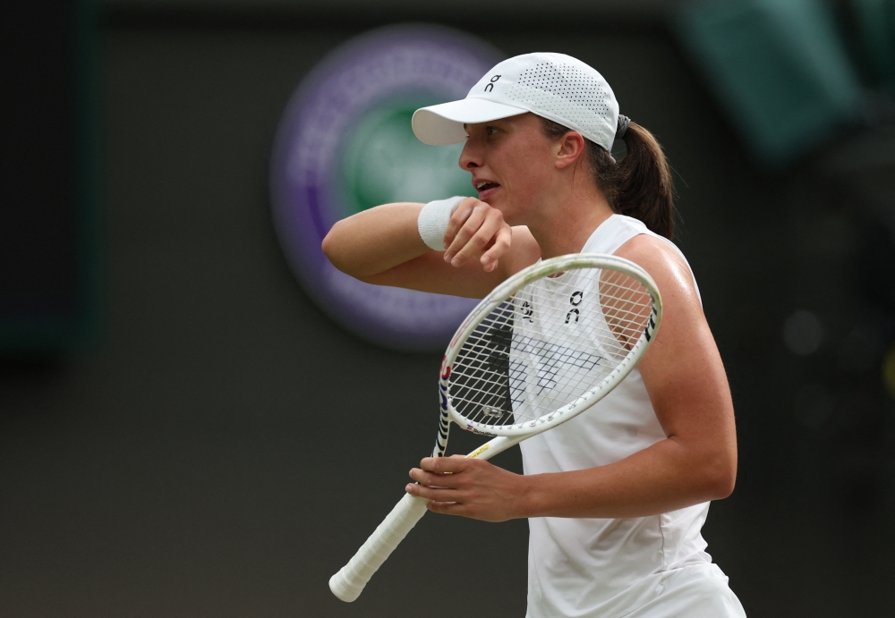 Poland's Iga Swiatek reacts during her third round match against Kazakhstan's Yulia Putintseva REUTERS
