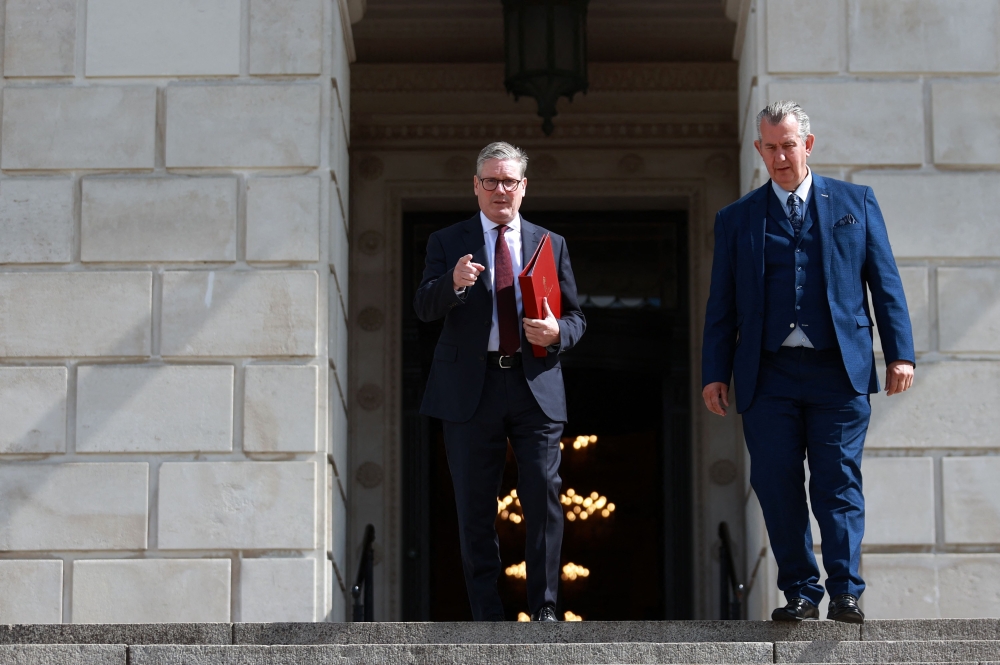 Britain's PM Keir Starmer (L) and Speaker of the Northern Ireland Assembly, Edwin Poots, outside of Parliament Buildings, the seat of the Northern Ireland Assembly, Belfast. — AFP 