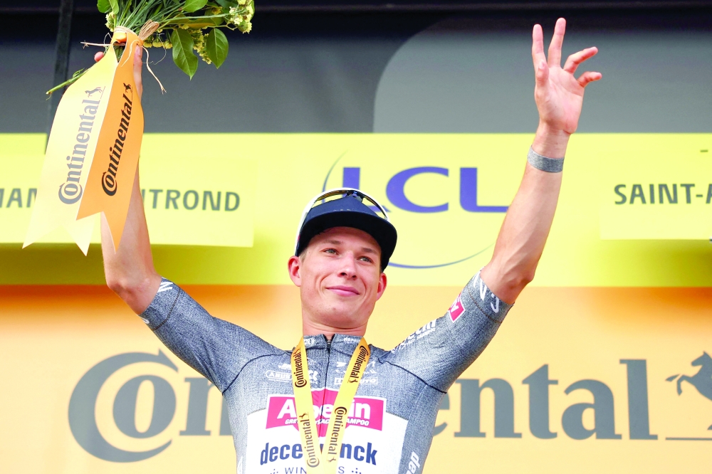 Jasper Philipsen celebrates on the podium. — AFP
