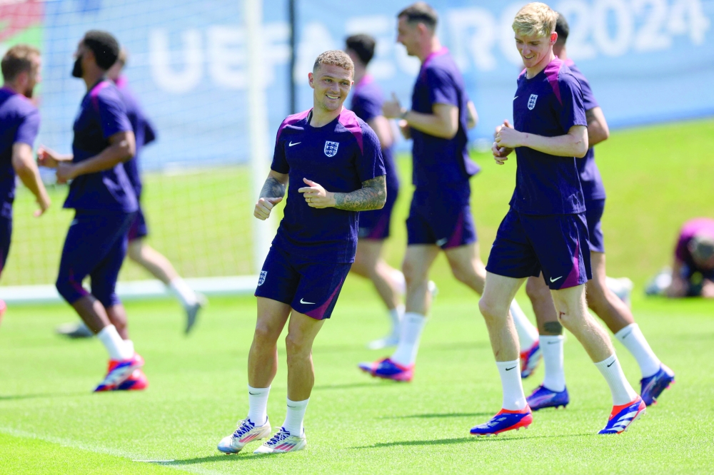 Kieran Trippier and England's forward #18 Anthony Gordon take part in a MD-1 training session at the team's base camp, the Weimarer Land golf resort, near Blankenhain, on July 9, 2024, ahead of their UEFA Euro 2024 football match against Netherlands.
