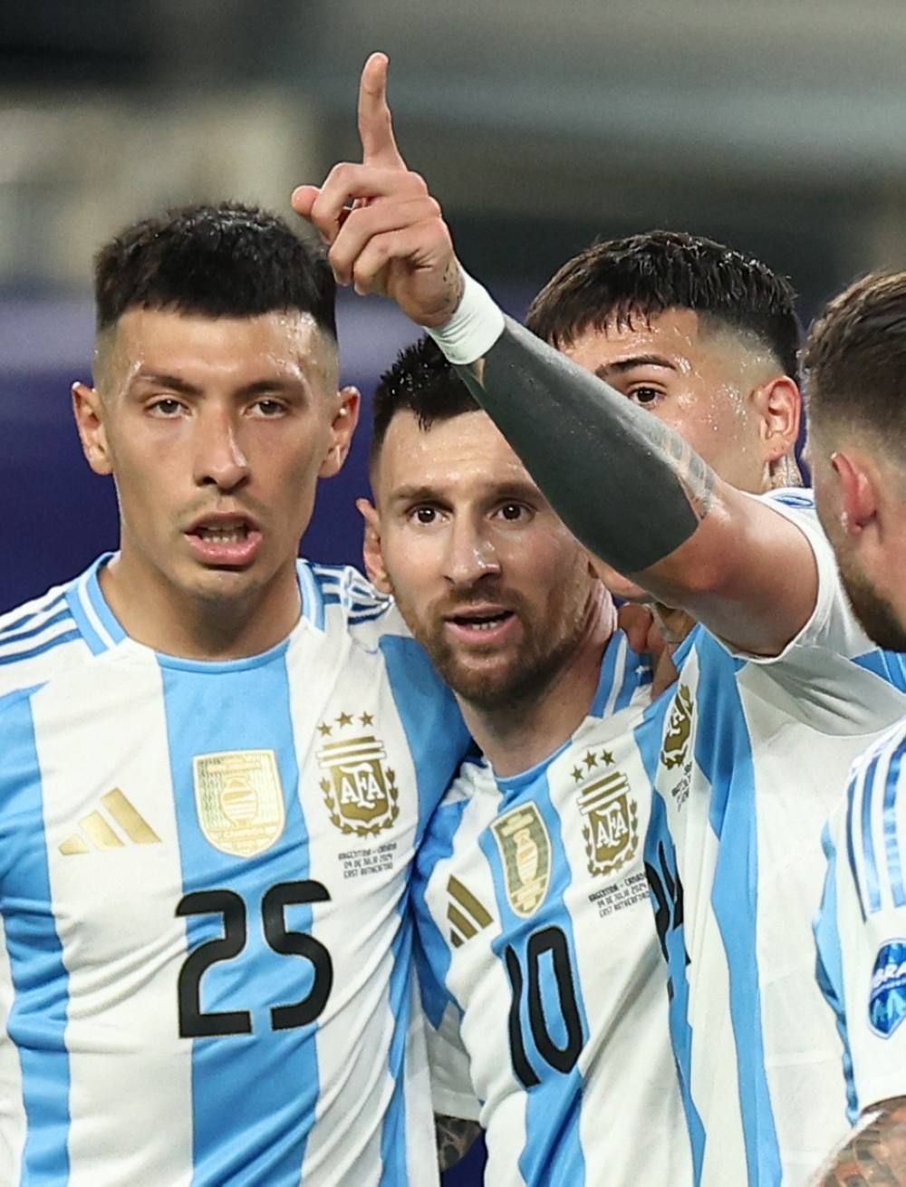 Argentina's Lionel Messi celebrates scoring their second goal. — REUTERS