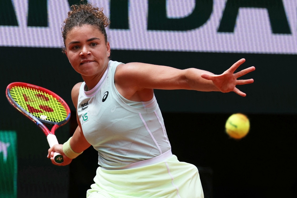 Italy's Jasmine Paolini plays a forehand return to Russia's Elina Avanesyan. — AFP

