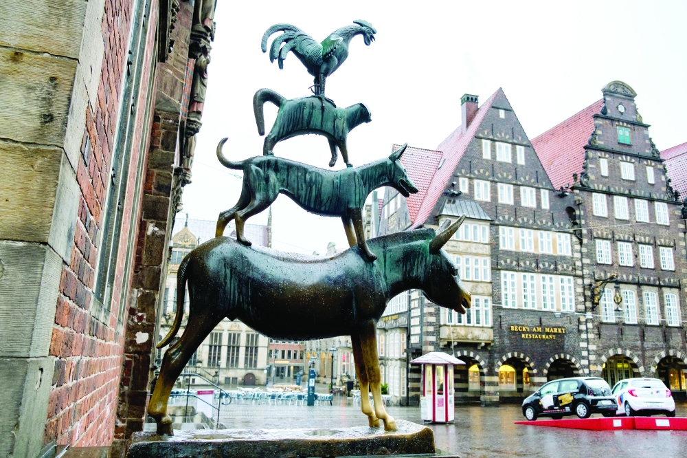 German climate activists smear iconic statue in Bremen with paint