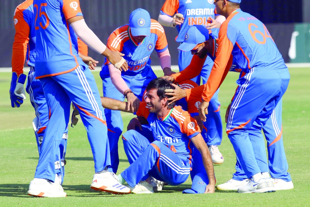 India's Ravi Bishnoi (C) is celebrates with teammates  