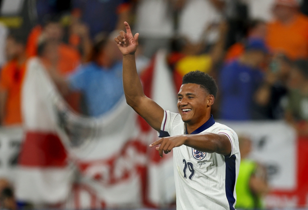 England's Ollie Watkins celebrates after the match. — Reuters
