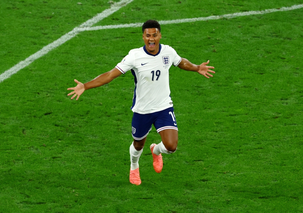 England's Ollie Watkins celebrates scoring their second goal. — Reuters
