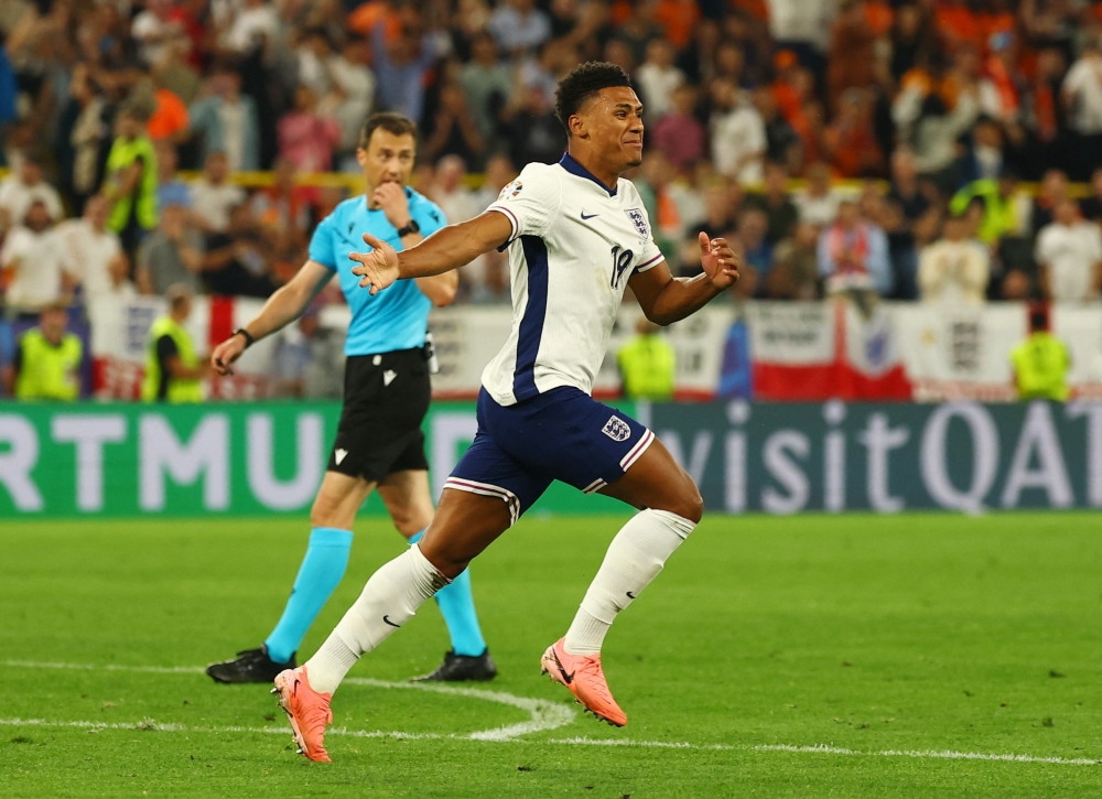 England's Ollie Watkins celebrates scoring their second goal. — Reuters