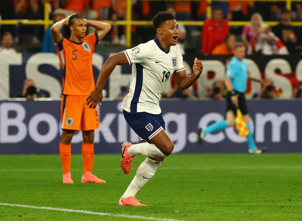 England's Ollie Watkins celebrates scoring their second goal. — Reuters 