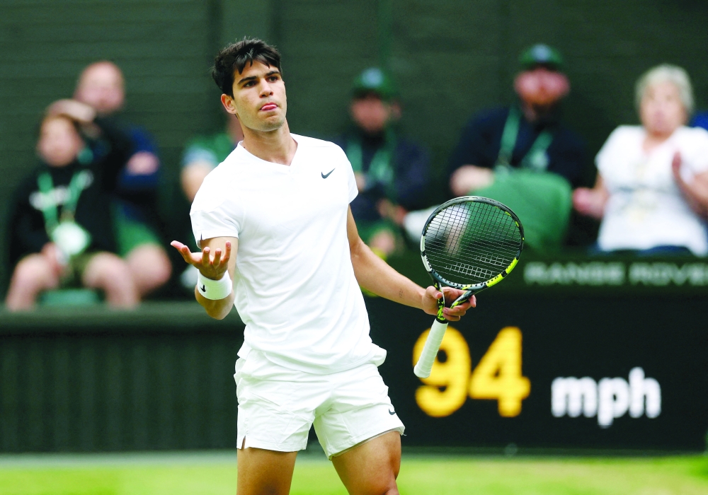 Alcaraz celebrates after winning his semi-final. —  Reuters