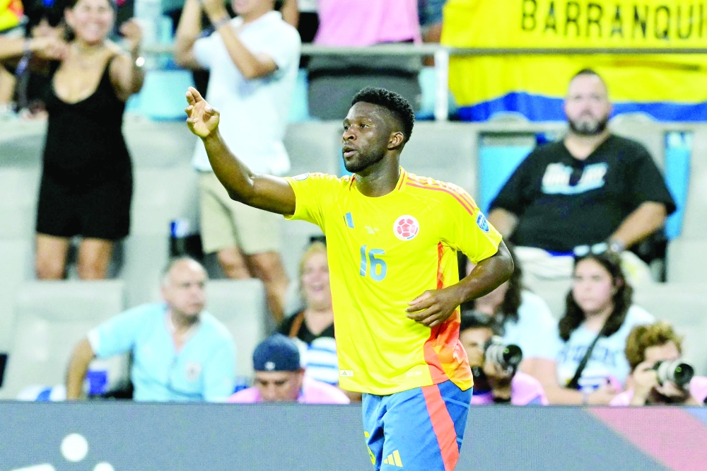 Colombia's Jefferson Lerma celebrates scoring first goal. — AFP