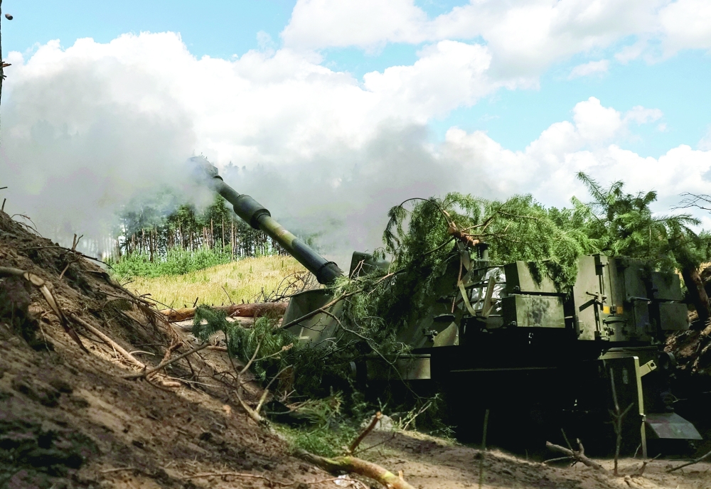 Ukrainian servicemen fire towards Russian troops at a front line, near Kupiansk in Kharkiv region. — Reuters file photo 