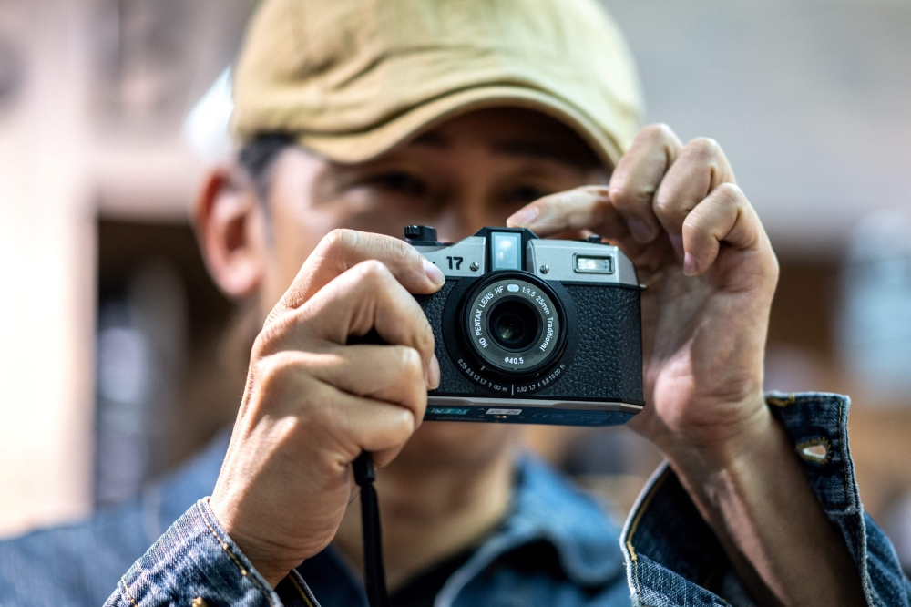 The newly-released Pentax 17 half-frame film camera. — AFP 