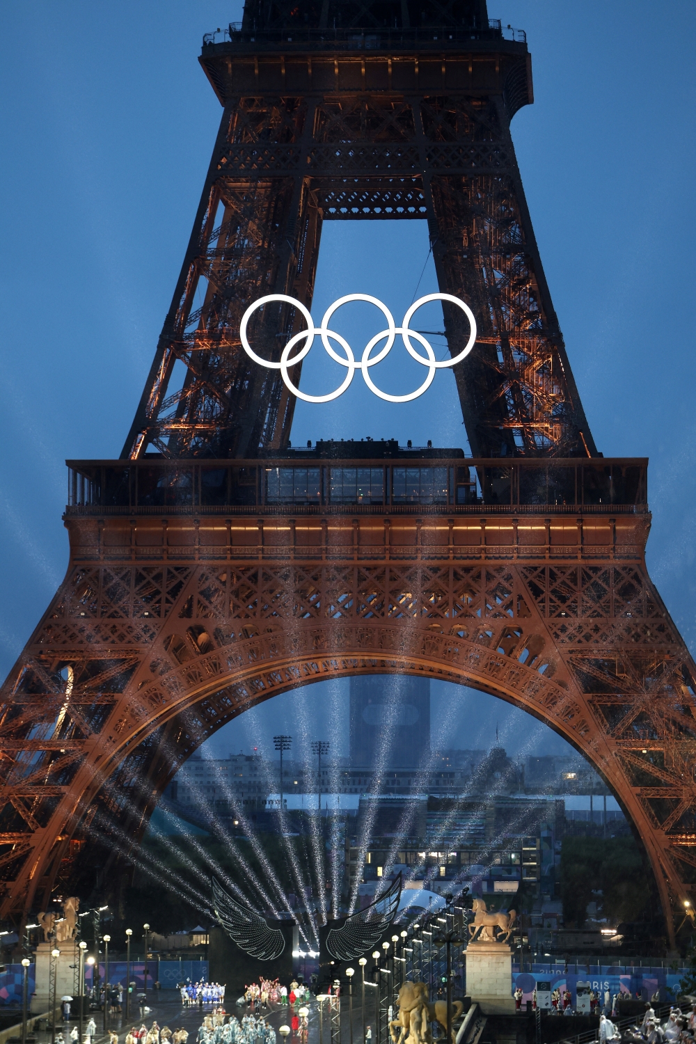 The Olympic Rings illuminate on the Eiffel Tower during the opening ceremony of the Olympic Games Paris 2024 on Friday. - Reuters