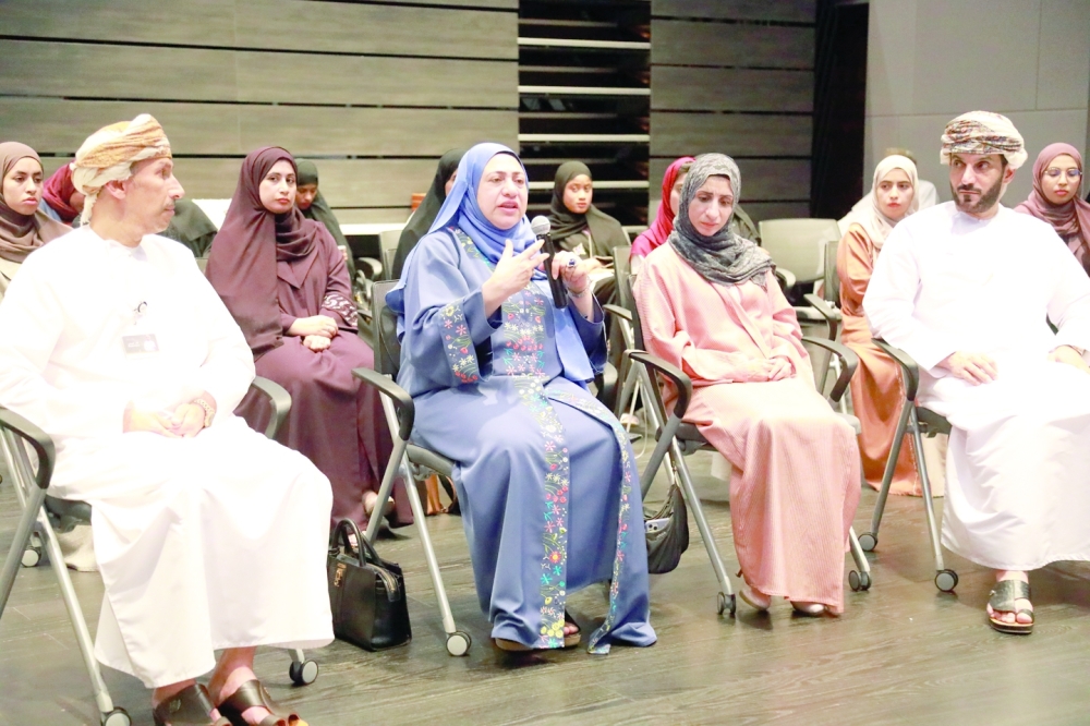 Dr Rahma bint Ibrahim Al Mahrooqi leading a panel discussion on AI in Genetic Resource Management