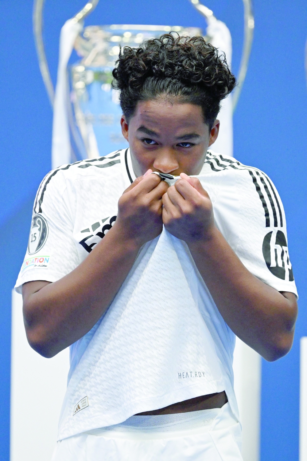 Endrick Felipe kisses the shield on his team shirt. — AFP
