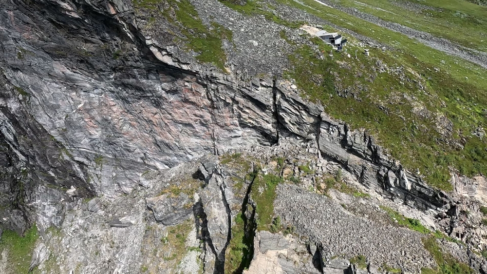 An aerial picture taken on June 25, 2024 in Stranda, Norway shows a big crack in the Akerneset mountainside that could cause a major landslide in the future.