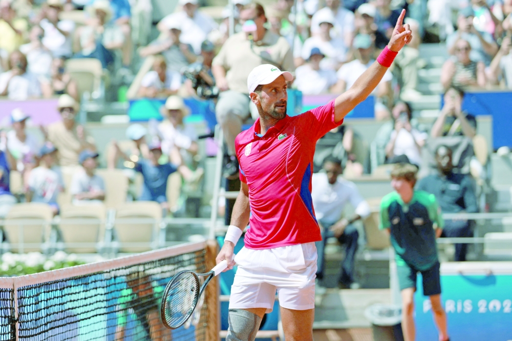  Novak Djokovic celebrates after the winning. — Reuters