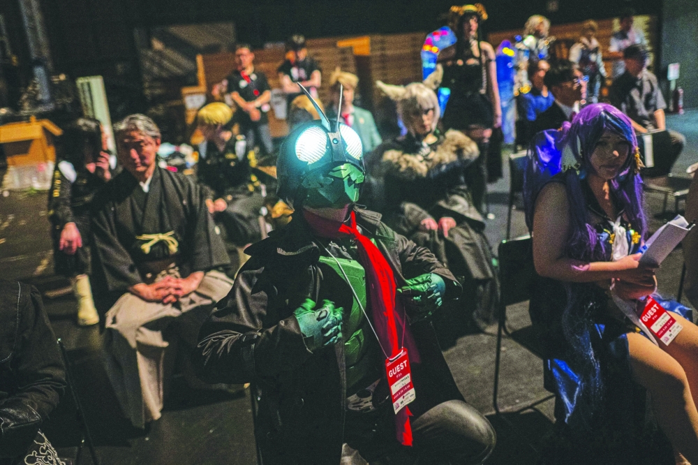 Competitors from 36 countries stand by backstage before the world cosplay championship 2024 during the World Cosplay Summit in Nagoya on August 3, 2024.
