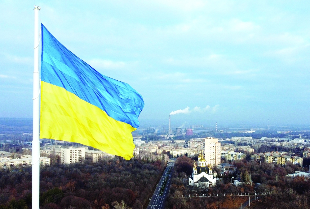 The national flag of Ukraine flies over the town of Kramatorsk