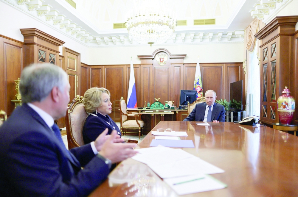 President Vladimir Putin (R) meets the Federation Council Speaker, Chair of the CIS Interparliamentary Assembly Valentina Matviyenko (C) and Chairman of the State Duma Vyacheslav Volodin (L), in Moscow. — AFP 