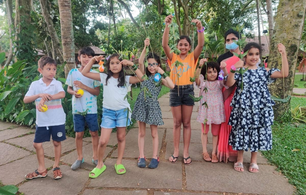 Ehildren enjoy natural surroundings at Kumarakom Lake Resort