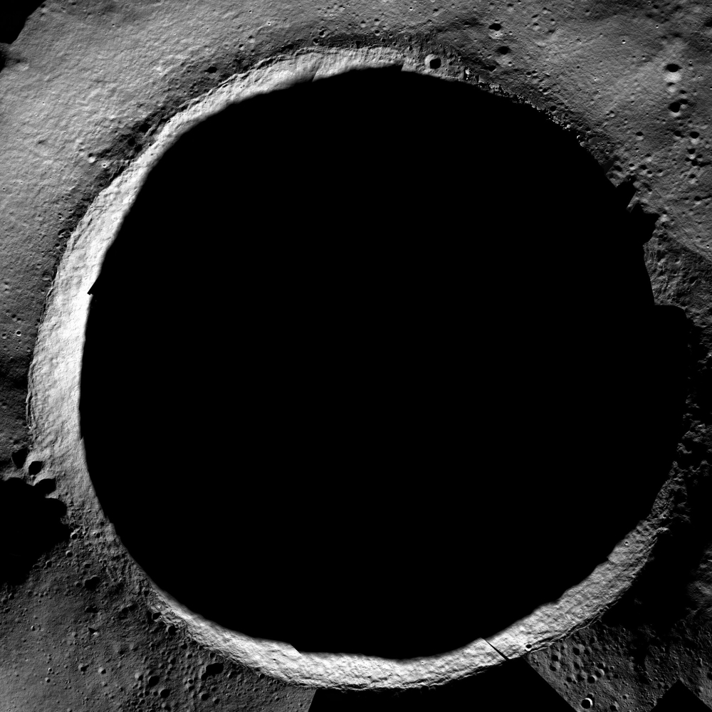 The Shackleton Crater on the moon. The 13-mile-wide crater lies close to the moons south pole. Here, the sun never rises high above the horizon, abd the rim of Shckleton blocks the suns rays from ever shining directly on the crater floor. (NASA/KARI/Arizona State University via The New York Times)