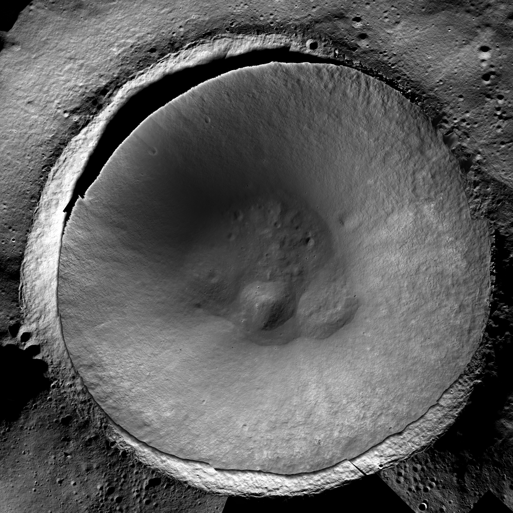 The Shackleton Crater, one of the pemanently shadowed crathers on the moon, as seen by NASAs new ShadowCam. Sunlight reflected off the moons surface or off Earth is enough to brighten the shadowed craters sufficiently for features to appear.  (NASA/KARI/Arizona State University via The New York Times)