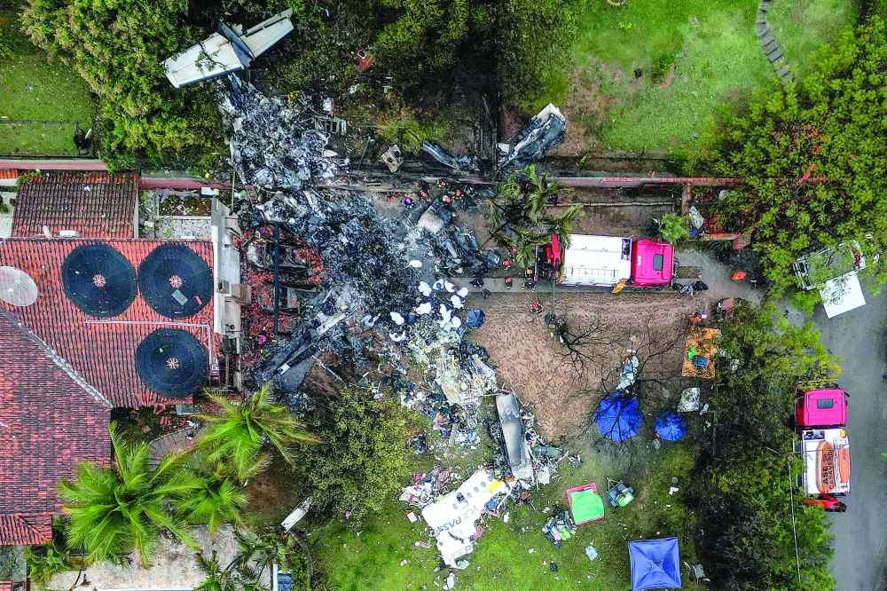 This photo shows the wreckage of an airplane that crashed with 61 people on board in Vinhedo, Brazil. — AFP 