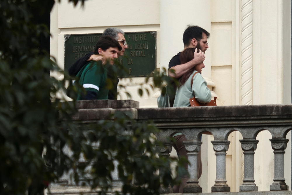 Relatives of the victims of a plane crash in Vinhedo visit Oscar Freire Institute in Sao Paulo, Brazil